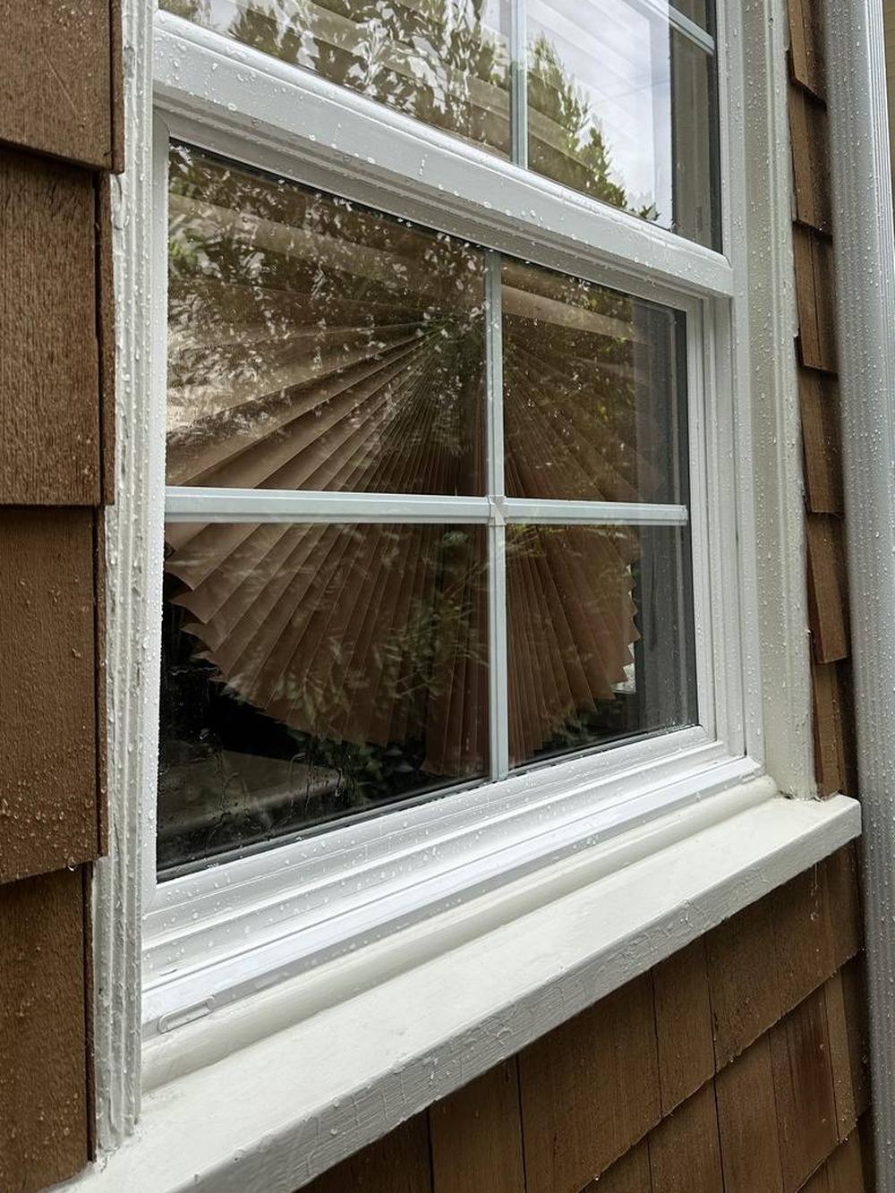 The same window, frame, and sill after a pure-water clean